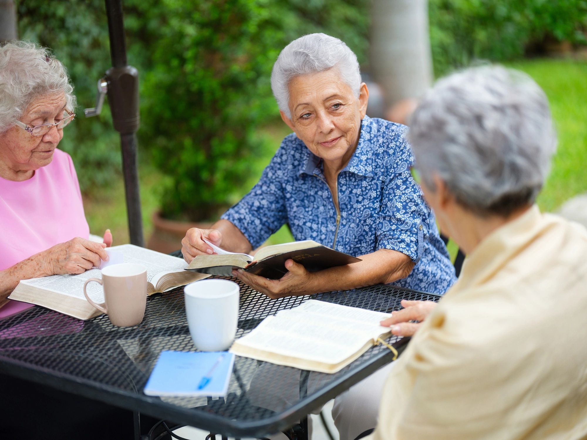 Friends reading and chatting together