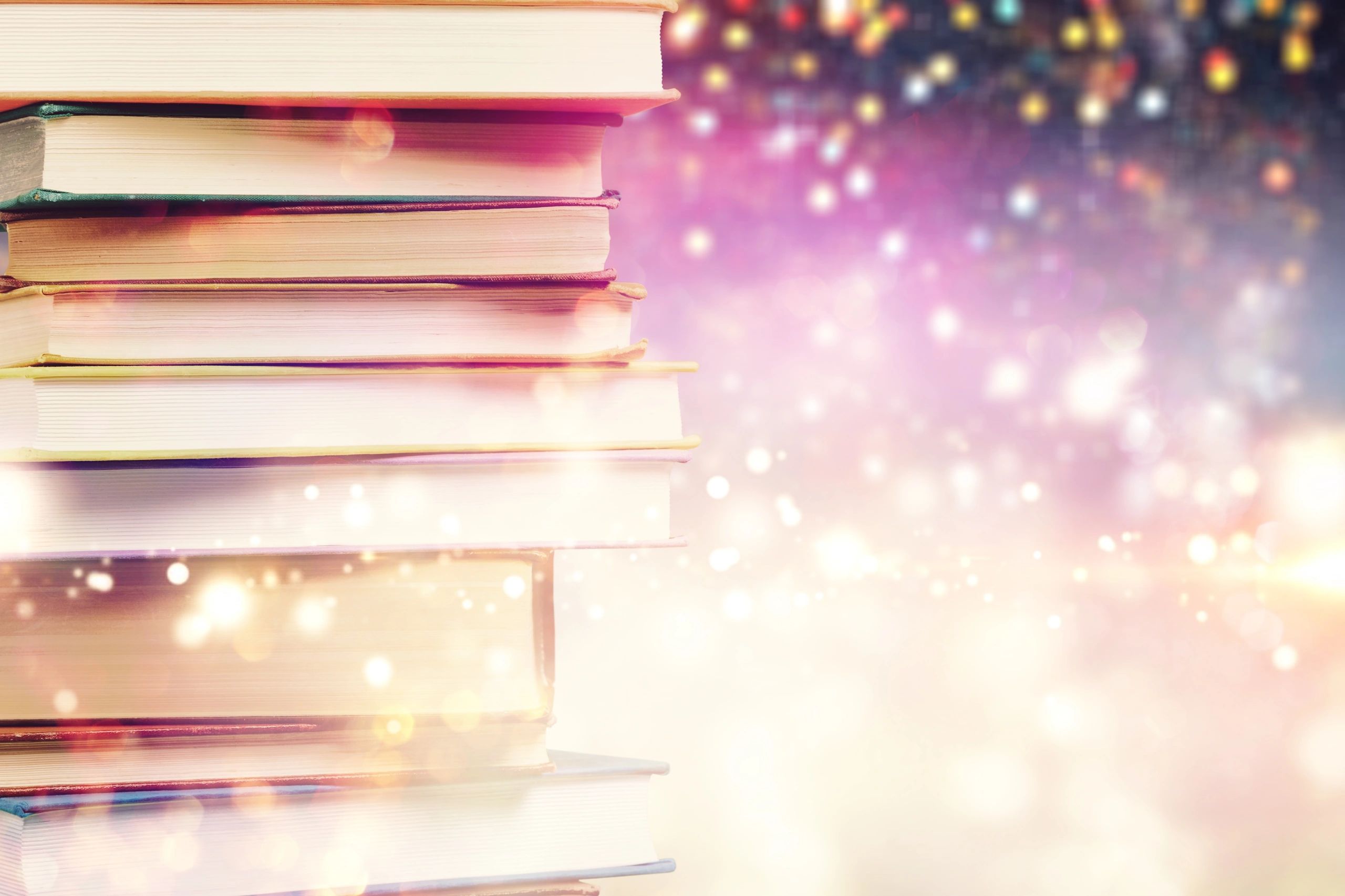 Stack of colorful books for romance reading picks