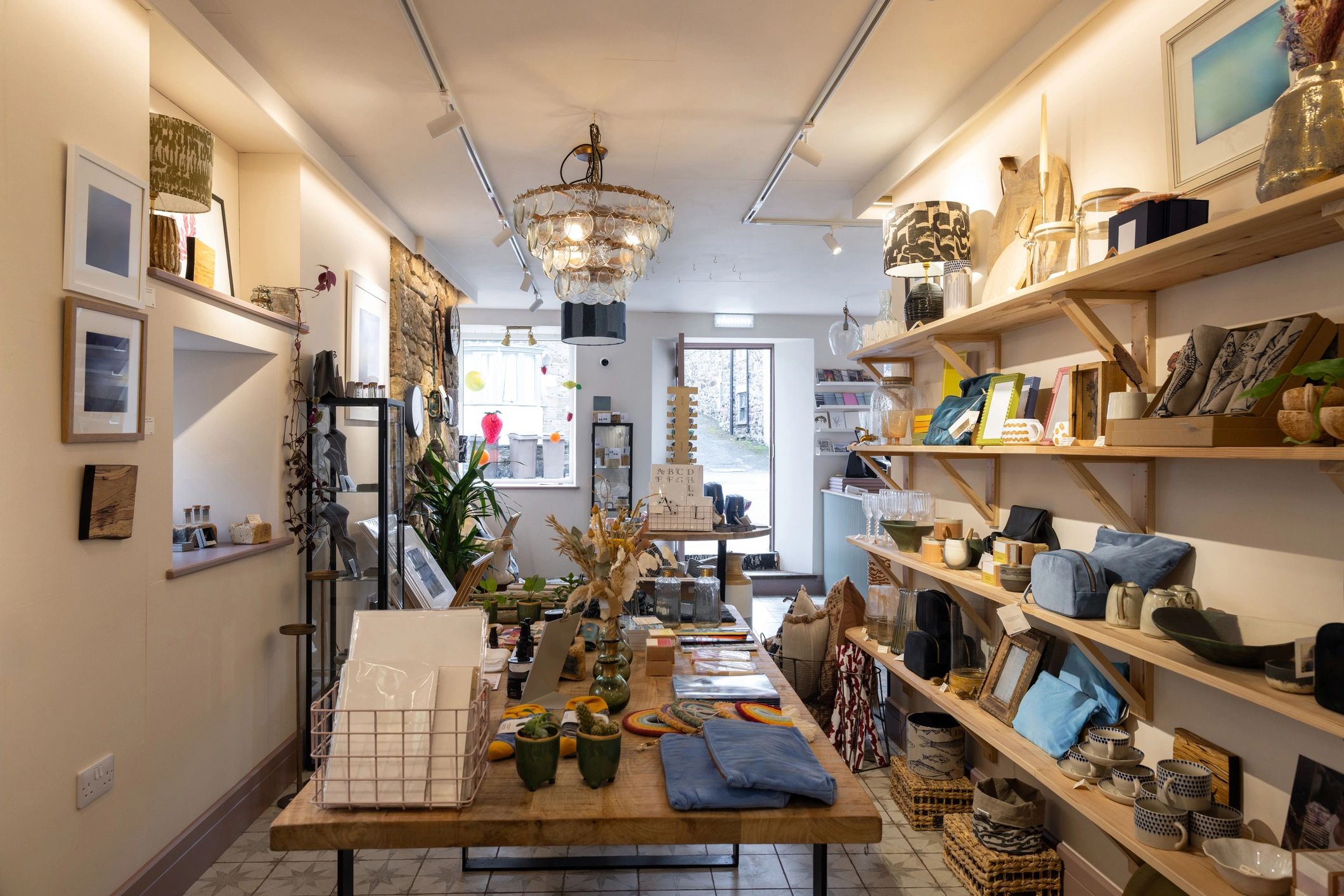 Cozy boutique bookstore interior with warm lighting and curated displays